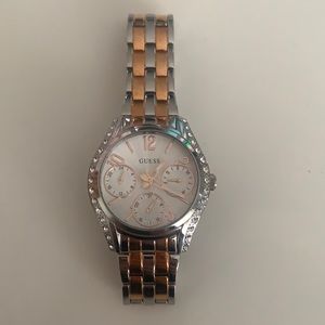 GUESS Two toned sliver and rose gold watch with stone details on sides